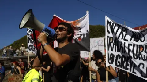 Countrywide Protests Break Out Opposing Spending Reductions
