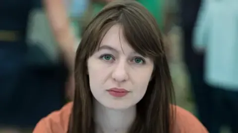 Irish author Sally Rooney declares she will not travel to the UK over legal concerns